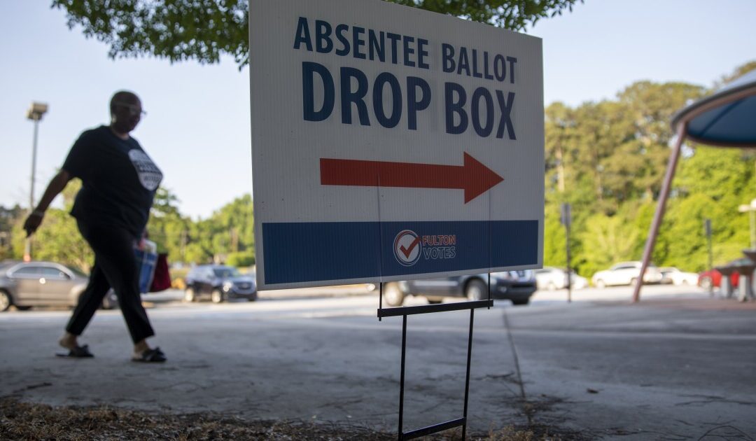 A new Georgia voting law reduced ballot drop box access in places that used them most