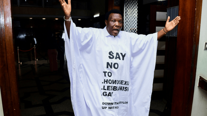 A Ugandan MP wore a gown with anti-homosexual slogans on it for the debate in parliament