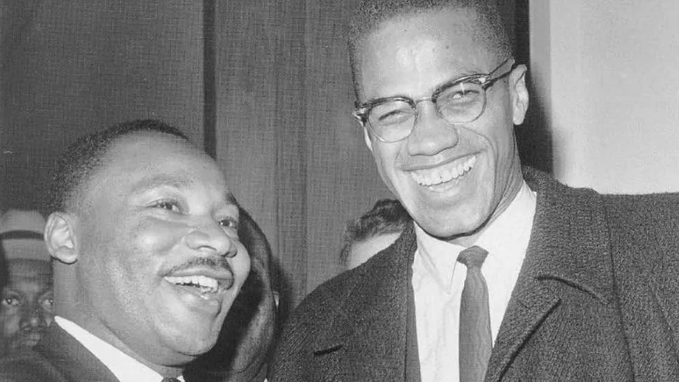 A photo of Martin Luther King and Malcolm X who are known to have only met briefly one time in passing.