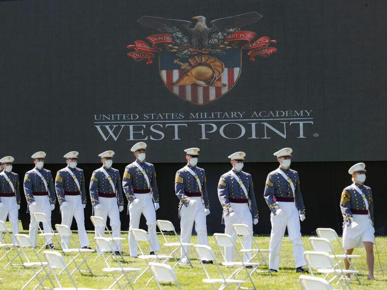 WEST POINT, NY - JUNE 13: West Point graduating cadets march to their socially-distanced seating during commencement ceremonies at Plain Parade Field at the United States Military Academy on June 13, 2020 in West Point, New York. U.S. President Donald Trump addressed the graduating class of 1,107 cadets during a socially-distanced ceremony held amid the COVID-19 pandemic. (Photo by John Minchillo-Pool/Getty Images)
